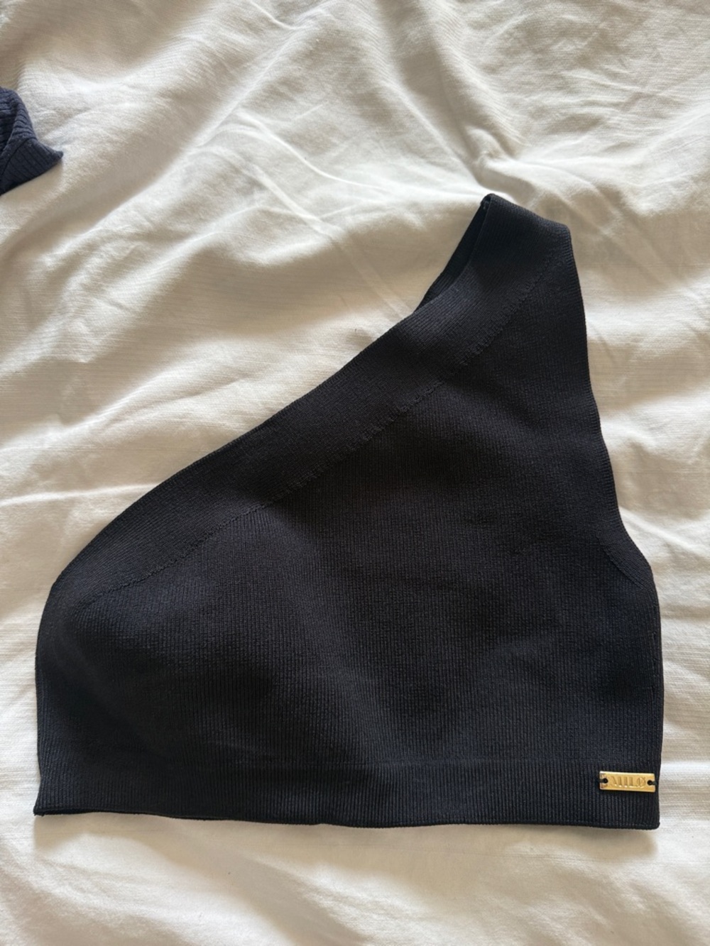 One-Shoulder Black Knit Top with Gold Accent